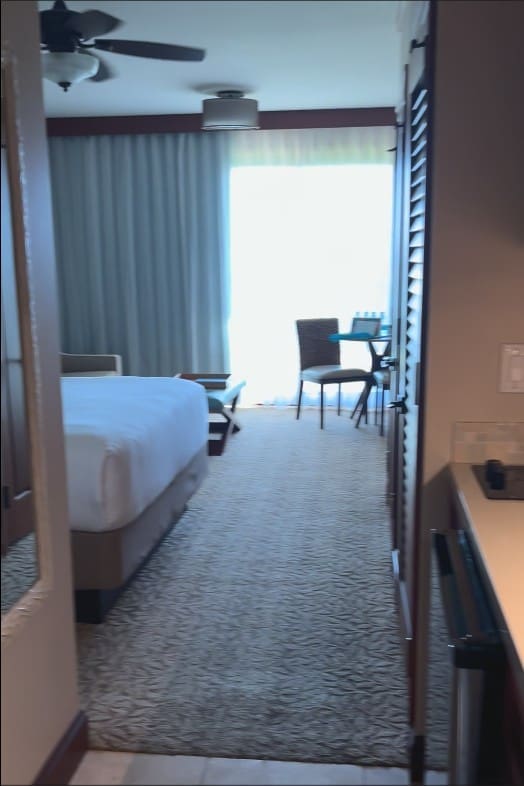 Interior of a Deluxe Studio at Kōloa Landing Resort in Poʻipū, Kauai, with king bed and kitchenette